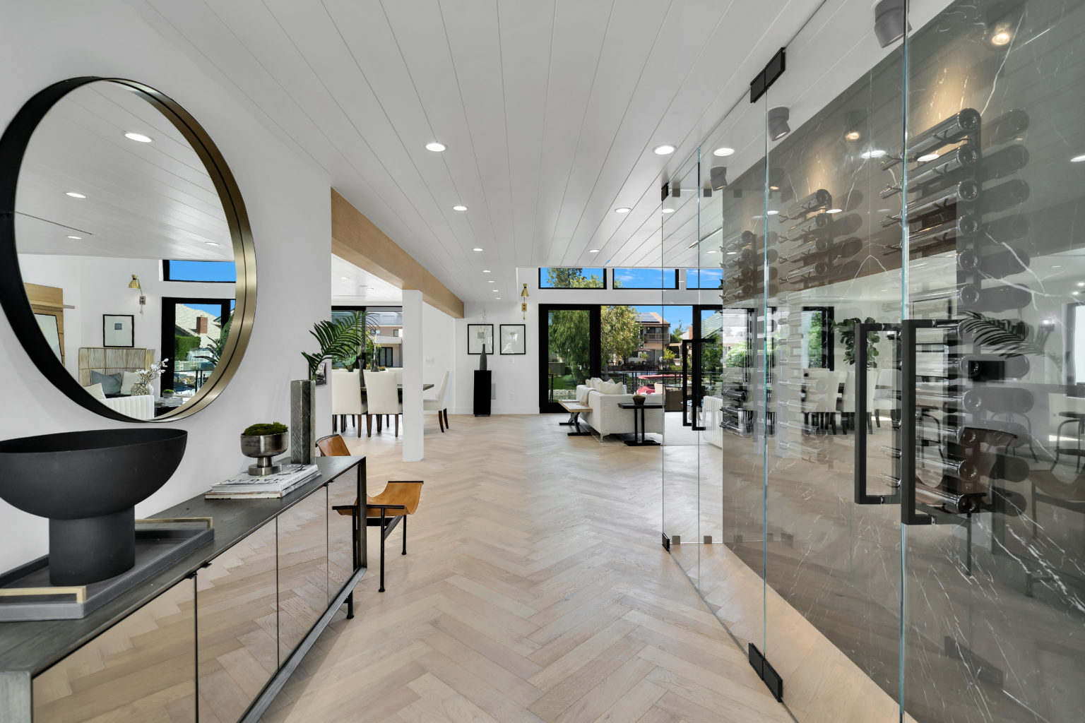 Wide-plank hardwood flooring in a finished open-plan living space, a completed Glamour Flooring project