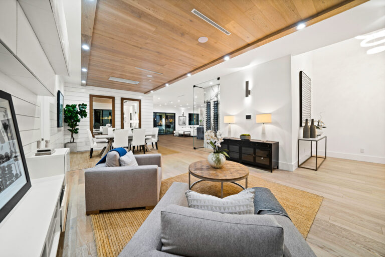 Open living room with wide-plank light oak hardwood floor