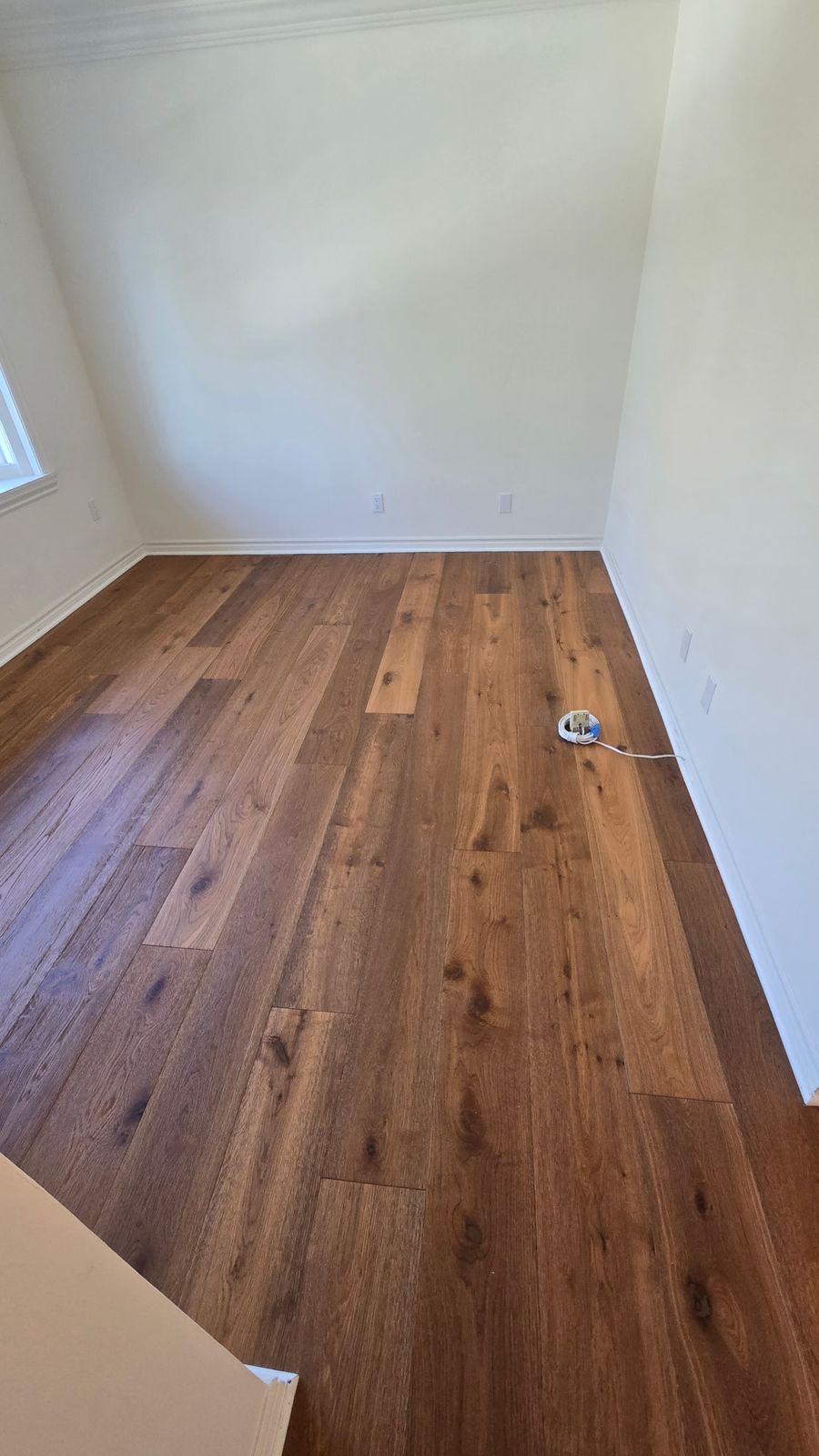 California Classics Aegean French oak flooring installed in a Woodland Hills bedroom