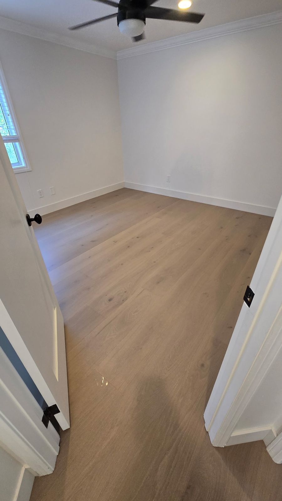 Light smoked European oak hardwood floor in a Los Angeles bedroom