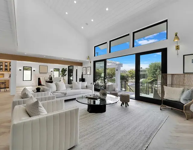 Living room with light European white oak floors, a Glamour Flooring project