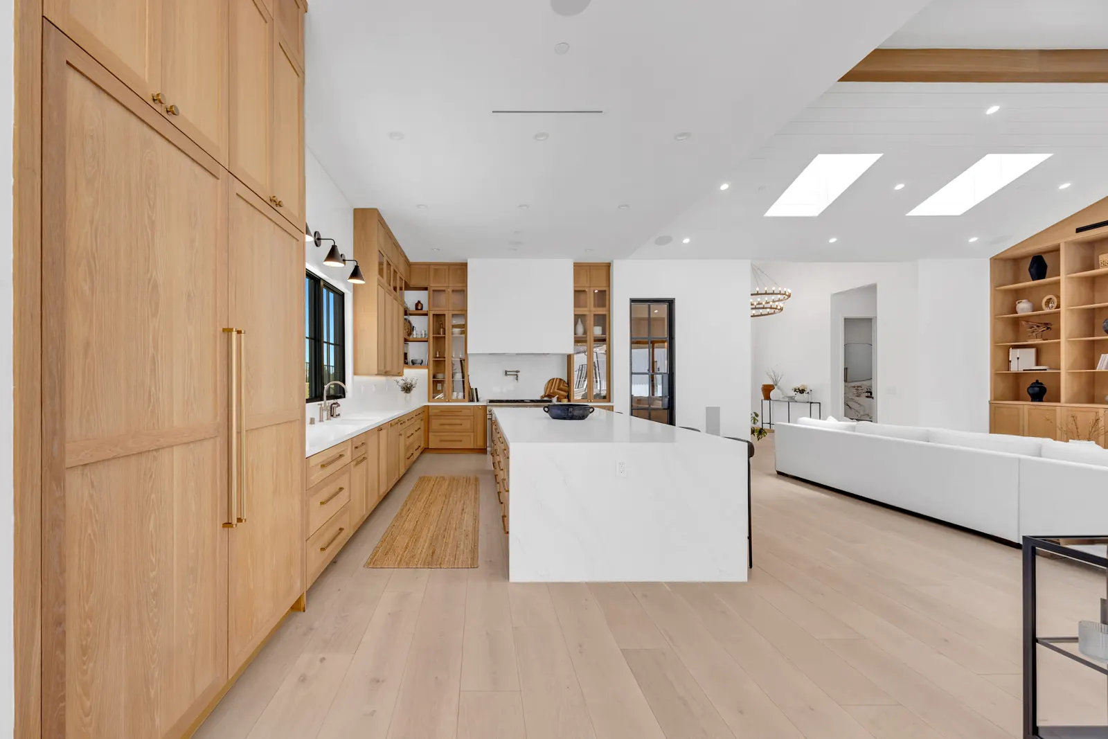Kitchen with full-height oak panels and white island, Porter Ranch, Glamour Flooring project