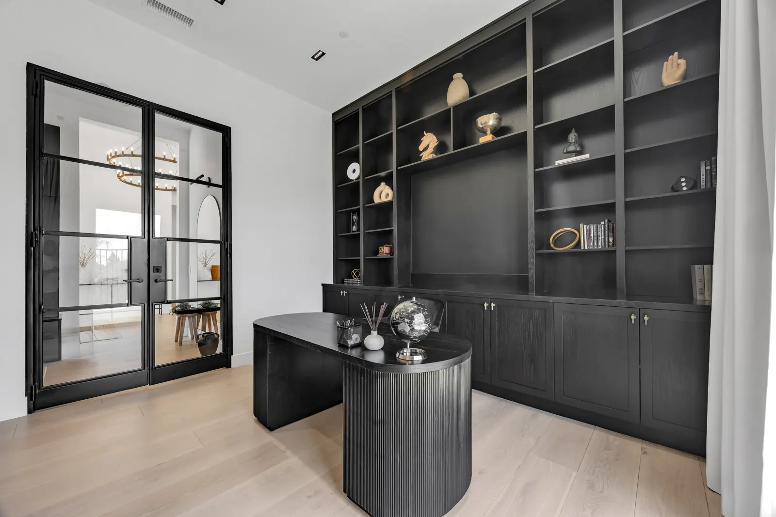 Home office with black built-in cabinetry and light hardwood, Porter Ranch, Glamour Flooring project