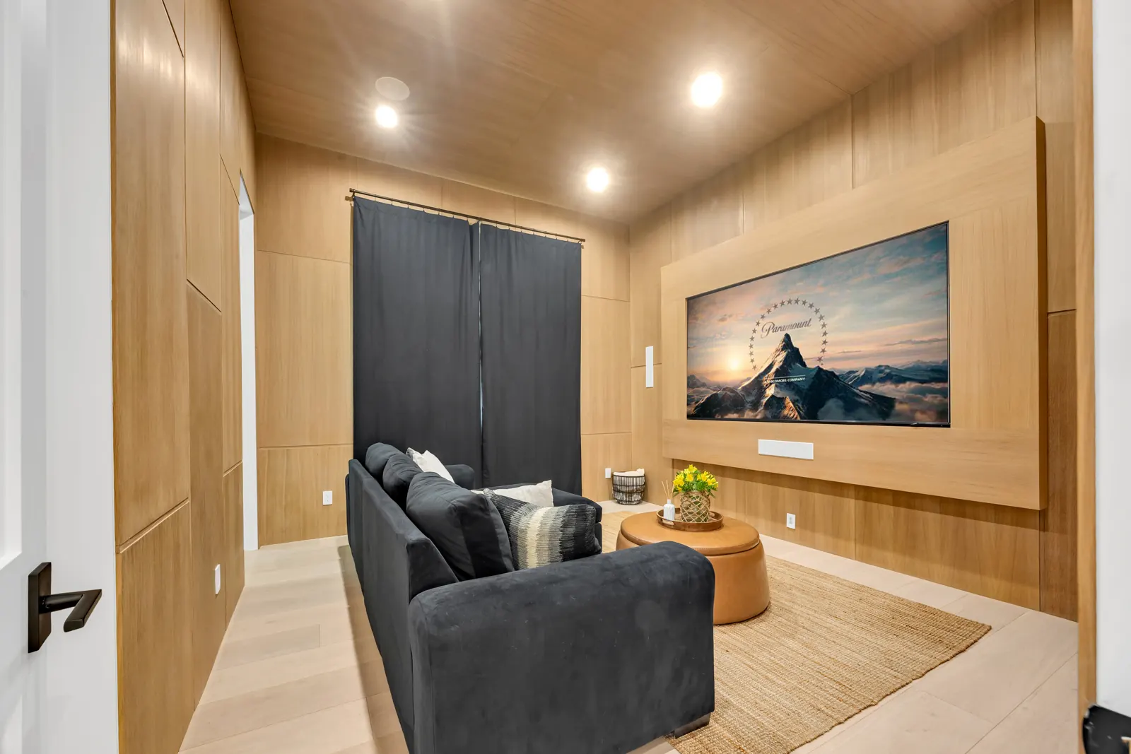 Media room with wood-panel walls and ceiling, Porter Ranch, Glamour Flooring project