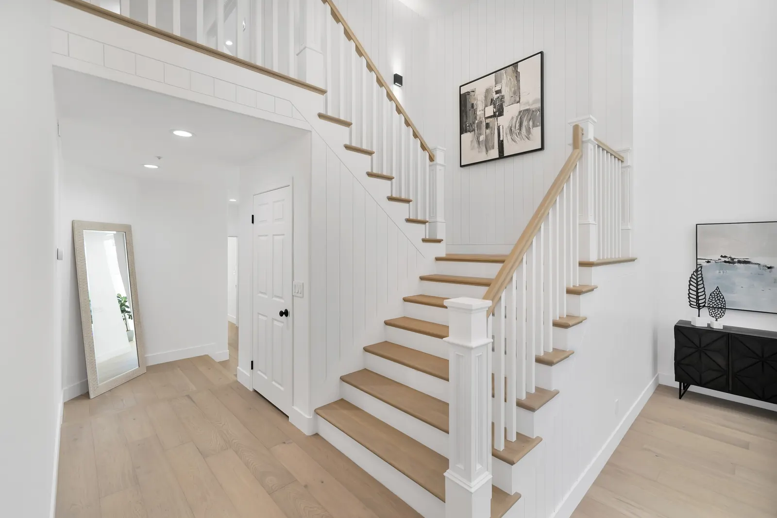 Staircase with oak treads and white risers, Granada Hills, Glamour Flooring project