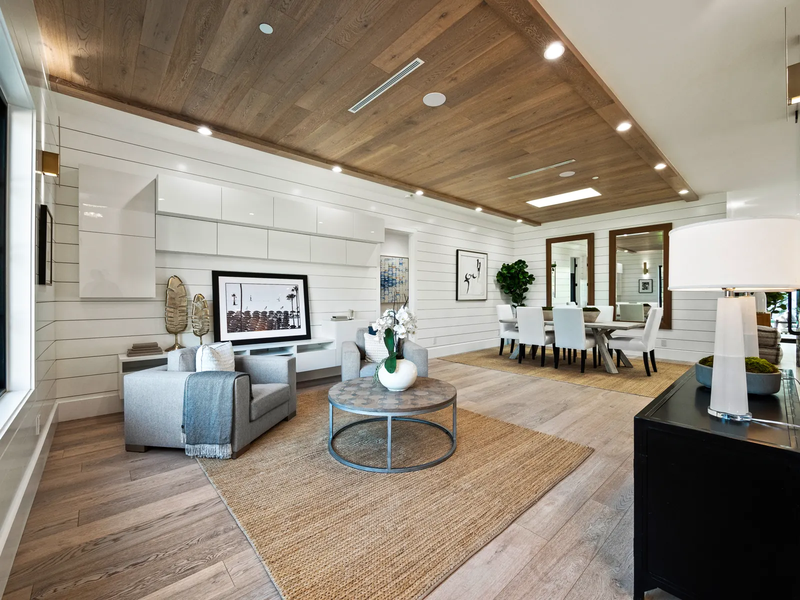 Living room with wood-plank ceiling and light hardwood, Los Angeles, Glamour Flooring project