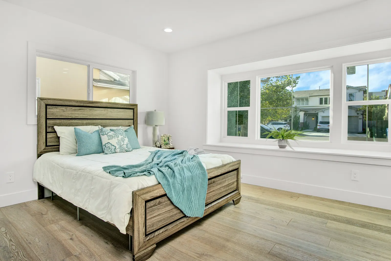 Bedroom with light wood-look flooring, Sherman Oaks, Glamour Flooring project