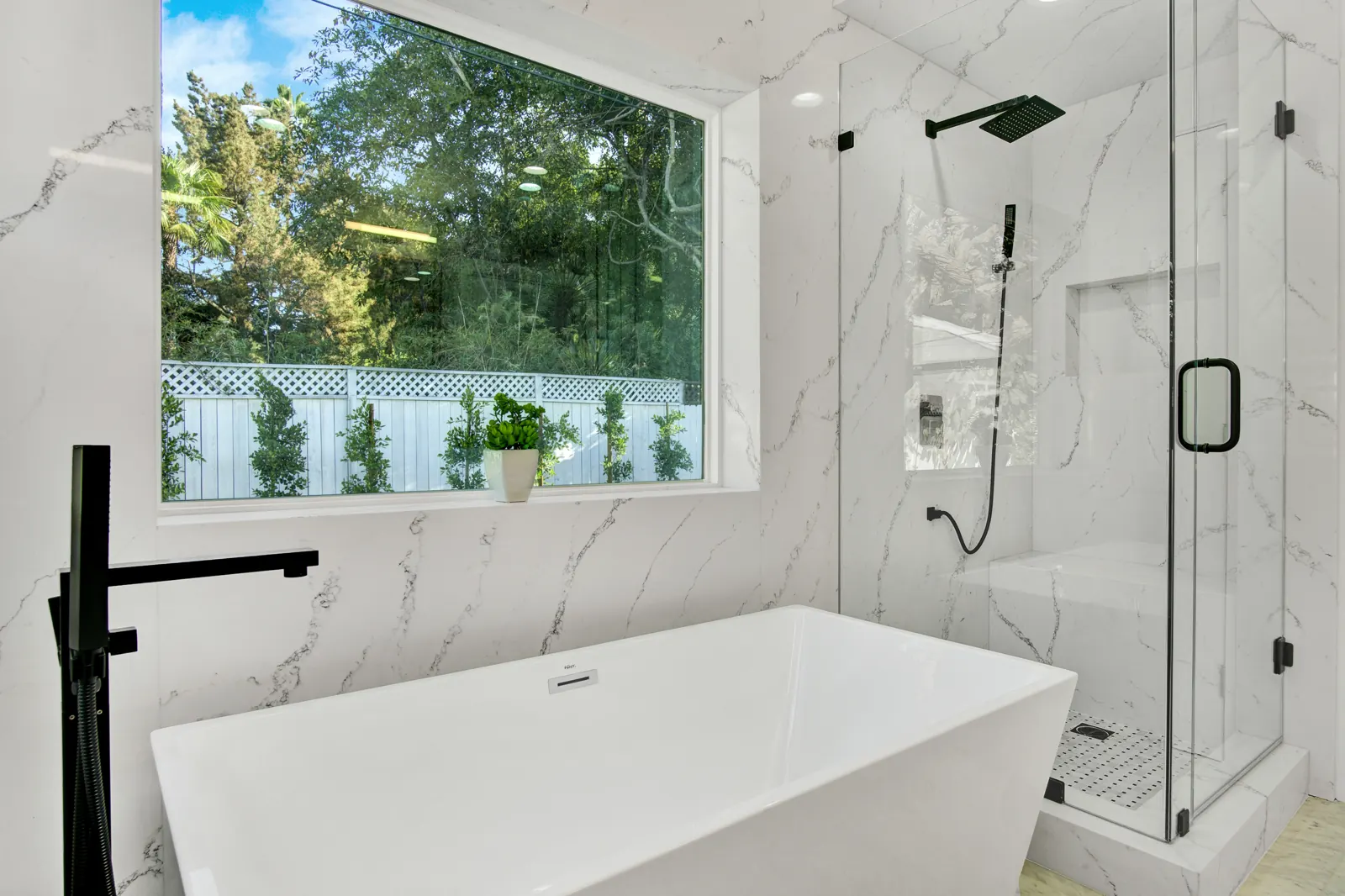 Bathroom with freestanding tub and glass shower, Sherman Oaks, Glamour Flooring project