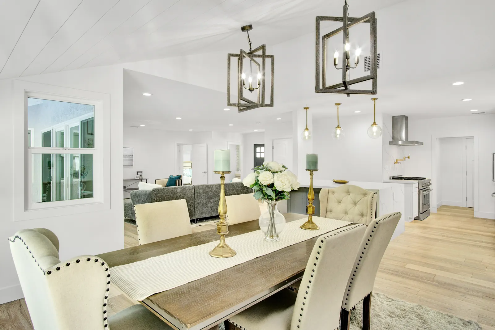 Dining room with light flooring and lantern pendants, Sherman Oaks, Glamour Flooring project